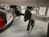 Electric bicycle, 3 wheeler, 24+20 inch with fat tires, 7 speed, white, disc brakes, shocks,